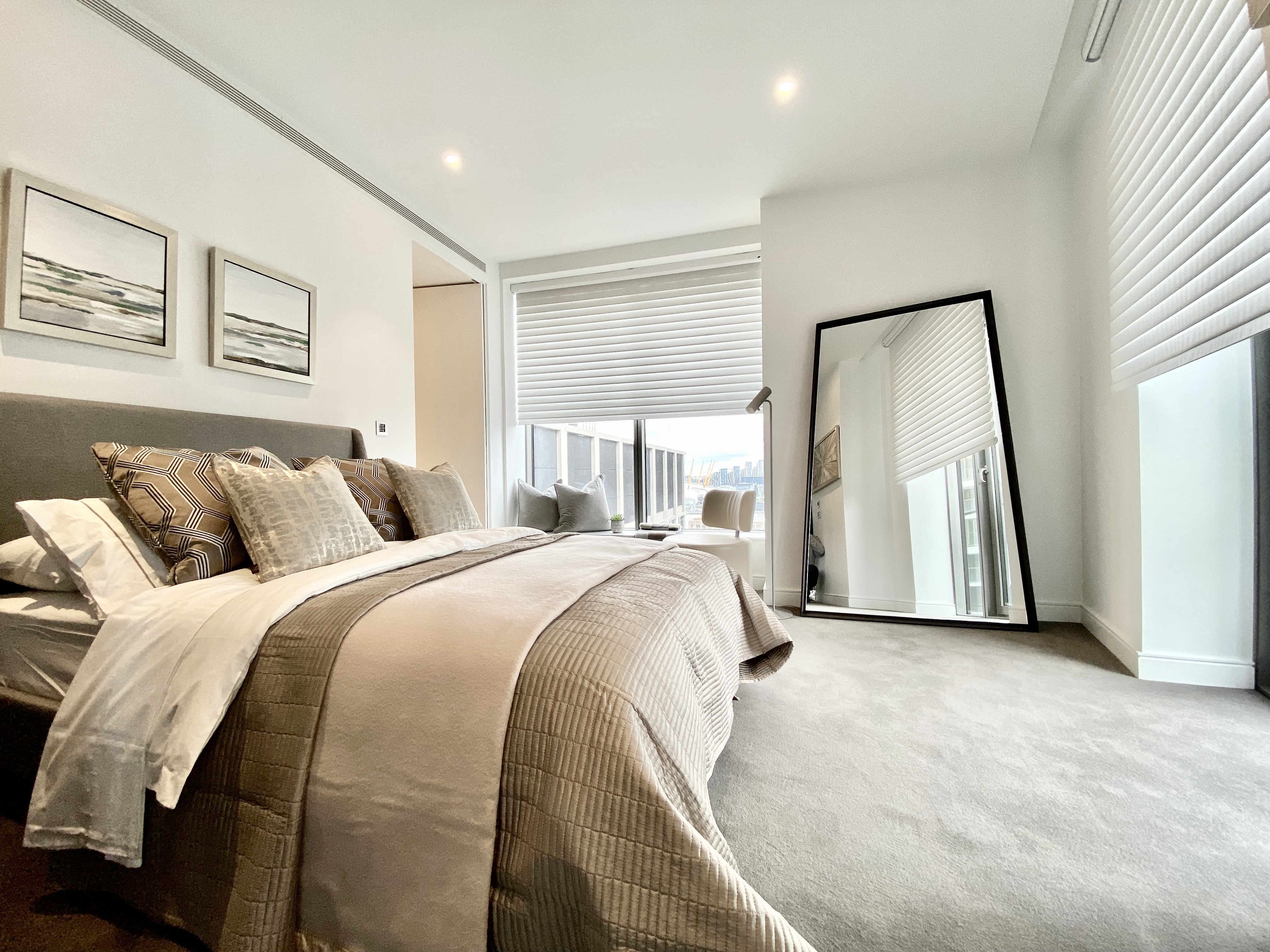 Bedroom with fitted blinds